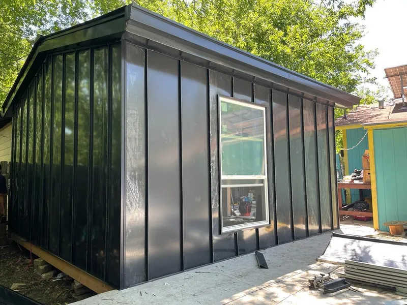 Black standing seam metal wall panels for Roof Inspection in Pomona