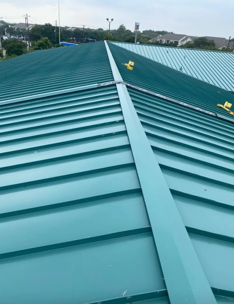Green commercial metal roof ridge and valley for Metal Roof Repair in Pomona